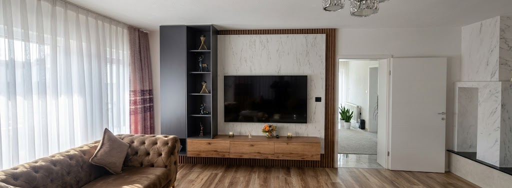 Modern media wall with marble panel, slatted wood detailing and floating console